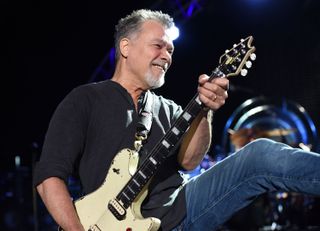 A picture of Eddie Van Halen playing guitar