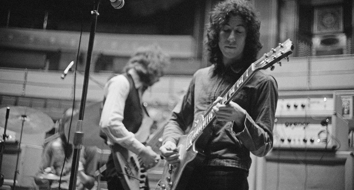 A black-and-white image of Peter Green playing a Gibson Les Paul Standard with Fleetwood Mac