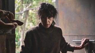 Sally Hawkins' Laura walking into backyard shed in Bring Her Back