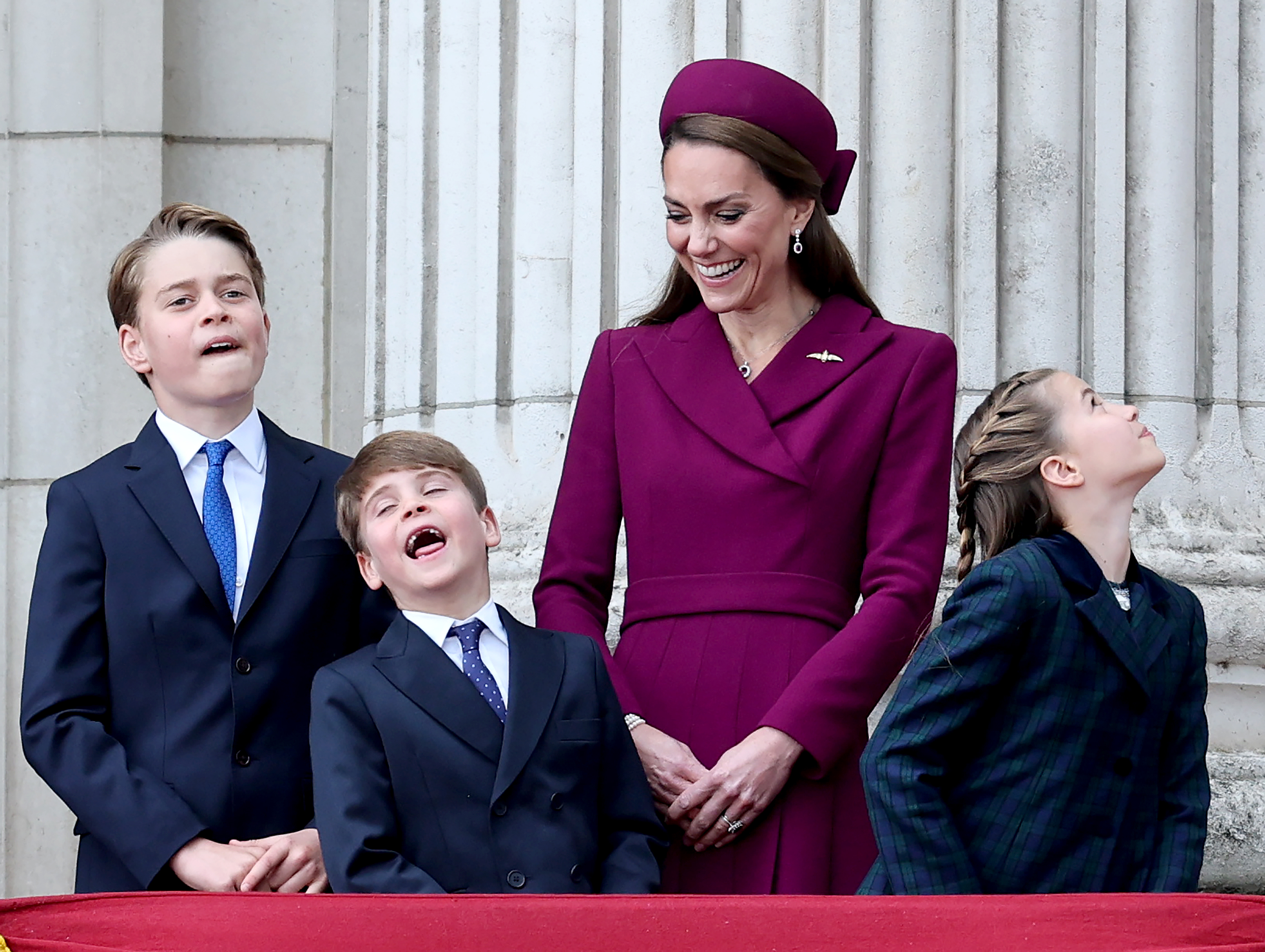 Princess Kate, Prince George, Prince Louis and Princess Charlotte laughing on the balcony of Buckingham Palace at VE Day parade