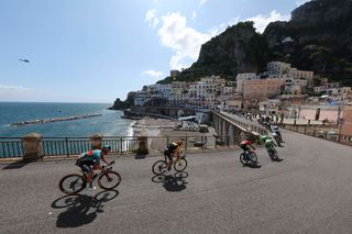 Cyclists compete in the sixth stage of the Giro dItalia 2023 cycling race 162 km between Naples and Naples on May 11 2023 Photo by Luca Bettini AFP Photo by LUCA BETTINIAFP via Getty Images