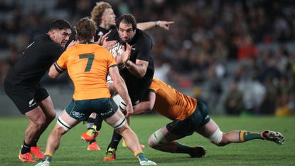  Captain Samuel Whitelock of New Zealand runs into a challenge from Captain Michael Hooper of Australia during The Rugby Championship