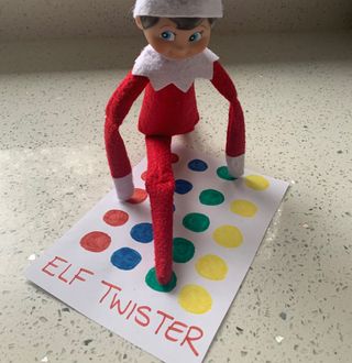 Elf on the shelf playing Elf Twister