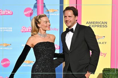 Margot Robbie (left) and Tom Ackerley (right) at the Barbie world premiere