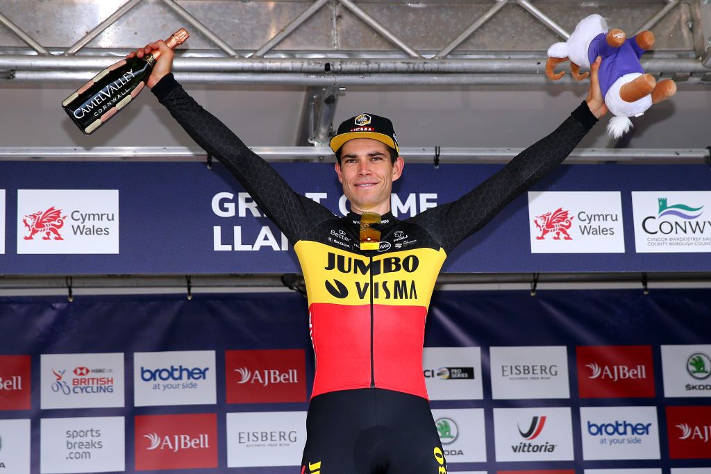 LLANDUDNO SEPTEMBER 08 Wout Van Aert of Belgium and Team Jumbo Visma celebrates at podium as stage winner during the 17th Tour of Britain 2021 Stage 4 a 210km stage from Aberaeron to Great Orme Llandudno 1306m TourofBritain TourofBritain on September 08 2021 in Llandudno United Kingdom Photo by Alex LiveseyGetty Images
