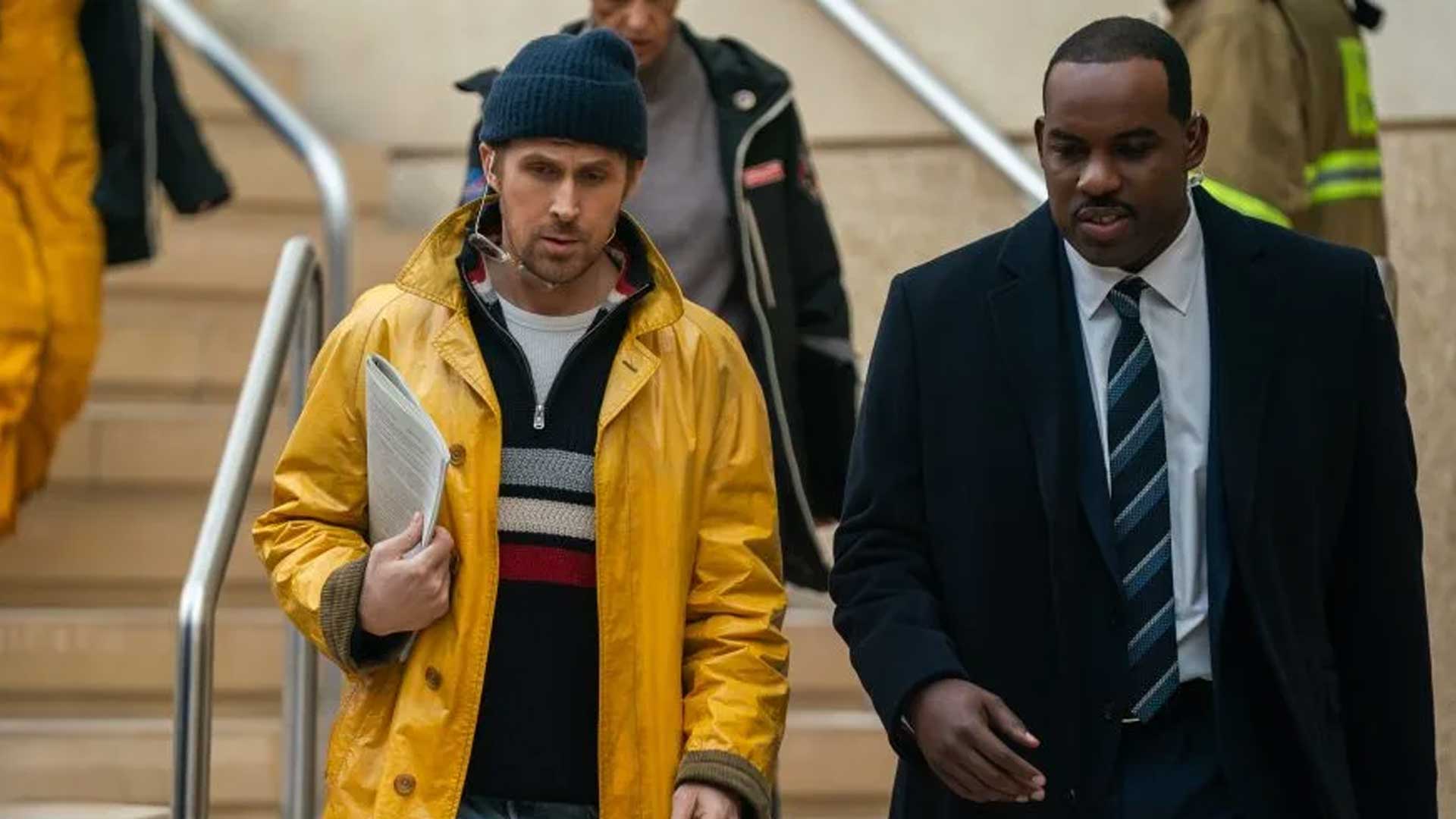 Ryland Grace, played by Ryan Gosling, and Carl, played by Lionel Boyce, walking down a set of stairs in the 2026 sci-fi movie Project Hail Mary.