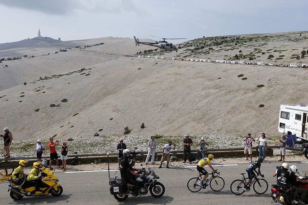 Overall leaders yellow jersey Britains Christopher Froome L rides after Colombias Nairo Quintana R during the 2425 km fifteenth stage of the 100th edition of the Tour de France cycling race on July 14 2013 between Givors and Mont Ventoux southeastern France AFP PHOTO JOEL SAGET Photo credit should read JOEL SAGETAFP via Getty Images