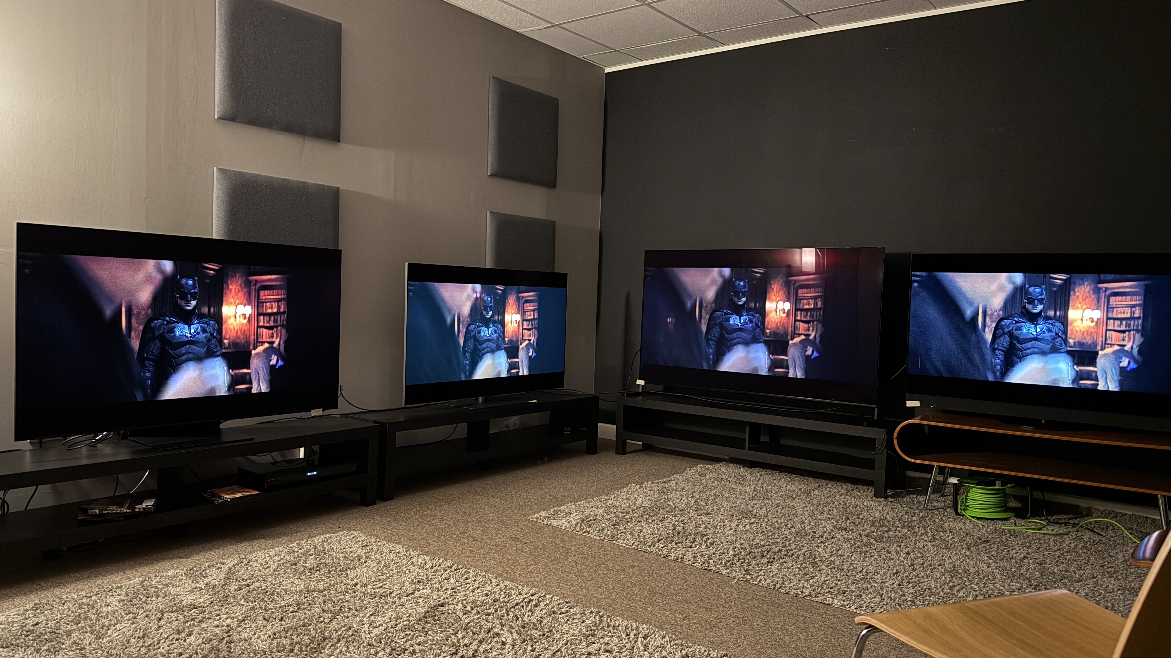 Samsung S95F (far left) LG G5 (middle left) Sony Bravia 8 II (middle right) Panasonic Z95B OLED TV (far right) OLED TVs all displaying The Batman on screen