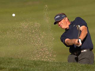 Colin Montgomerie hitting a bunker shot