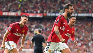 Manchester United player Bruno Fernandes celebrates after scoring the third United goal during the Premier League match between Manchester United and Nottingham Forest at Old Trafford on August 26, 2023 in Manchester, England. (Photo by Stu Forster/Getty Images)