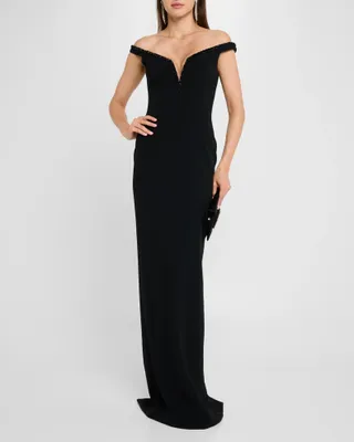 An off the shoulder black Pamella Roland gown