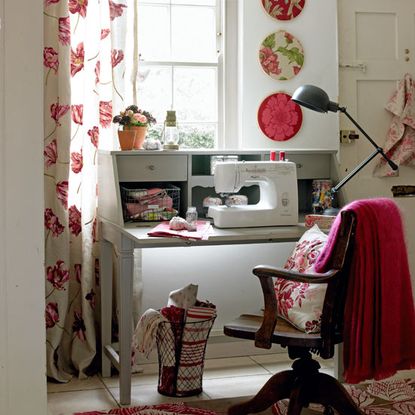 white craft room with table and sewing machine