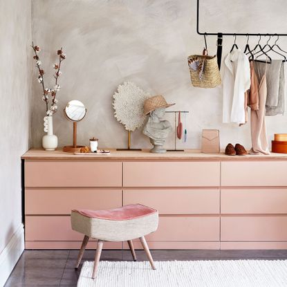 Painted Ikea Malm units and ceiling mounted clothes rail
