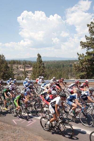 The elite men's peloton tackles a climb.