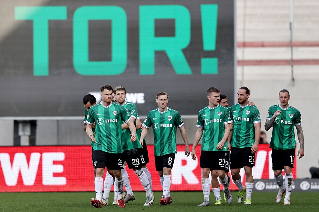 Jannis Heuer of SC Preussen M&amp;uuml;nster #(2nd R) celebrates the first goal qwith his team mates during the 2. Bundesliga match between SC Preu&amp;szlig;en M&amp;uuml;nster and Hertha BSC at Preussenstadion on March 08, 2026 in Muenster, Germany.