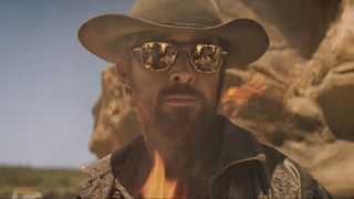 Ryan Gosling's Colt Seavers wears a cowboy hat and shades in The Fall Guy movie