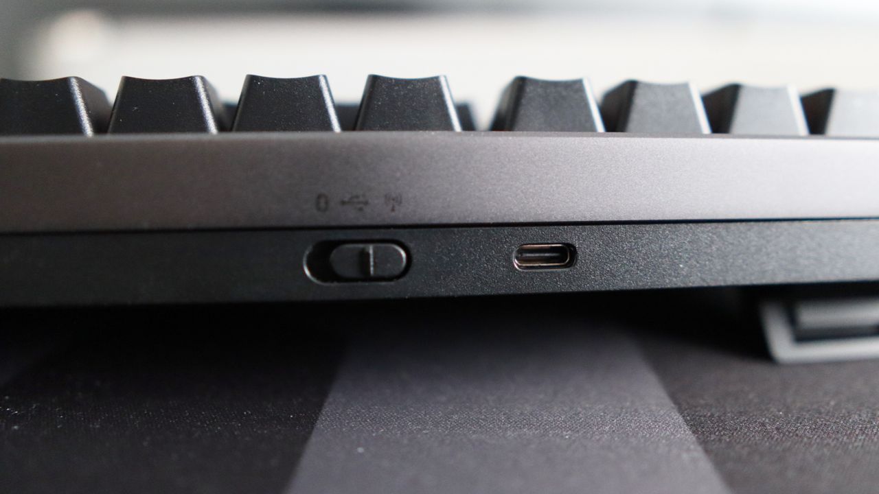 Asus ROG Strix Morph 96 Wireless on a desk mat.