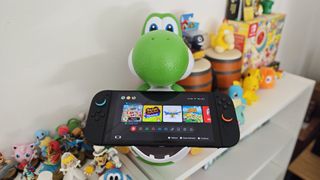 Yoshi popcorn bucket holding Nintendo Switch 2 system