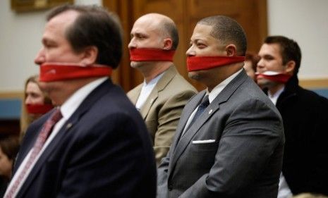 Supporters of a woman&amp;#039;s right to choose abortion stand in silent protest during a &amp;quot;No Taxpayer Funding For Abortion Act&amp;quot; hearing Tuesday. 