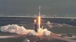 A SpaceX Falcon 9 rocket launches the classified NROL-108 spy satellite into orbit from Pad 39A of NASA's Kennedy Space Center in Cape Canaveral, Florida on Dec. 19, 2020.