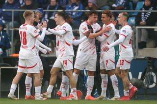 Antonio Nusa of RB Leipzig celebrates the team's second goal with teammates during the Bundesliga match between VfL Bochum 1848 and RB Leipzig at Vonovia Ruhrstadion on January 18, 2025 in Bochum, Germany.