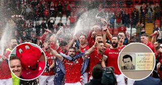 Wrexham players celebrate promotion to League One