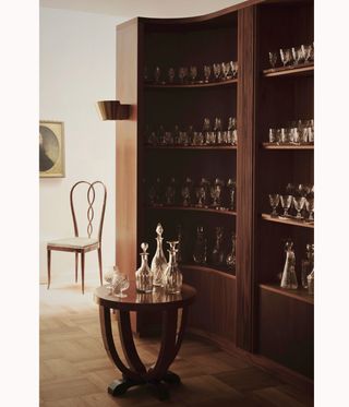 interior of London mews, decanters on low table