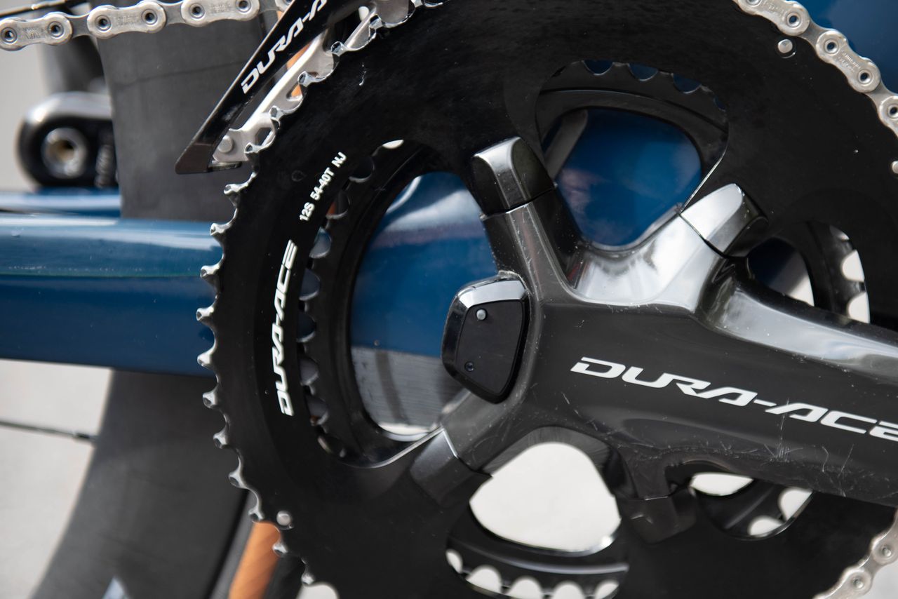A close up of the 12-speed Dura-Ace power meter crankset used on Michal Kwiatkowski's Pinarello Dogma F