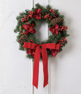 Christmas wreath with oversized red bow from Saks Fifth Avenue.