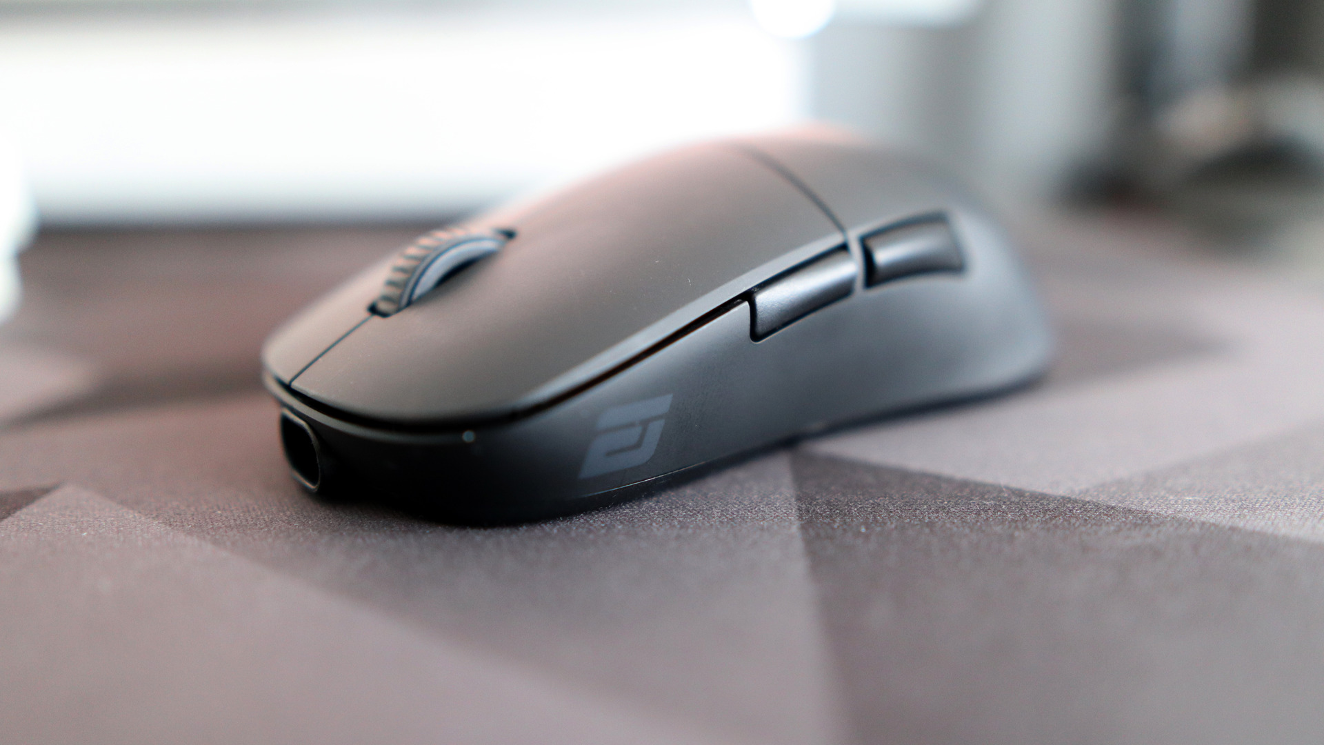 Endgame Gear XM2w 4K gaming mouse on a mouse pad.