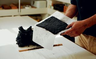 Black square pulp on parchment paper