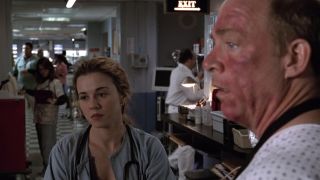 JK Simmons looking to the left, upset, on ER