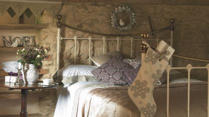 bedroom in country cottage at christmas