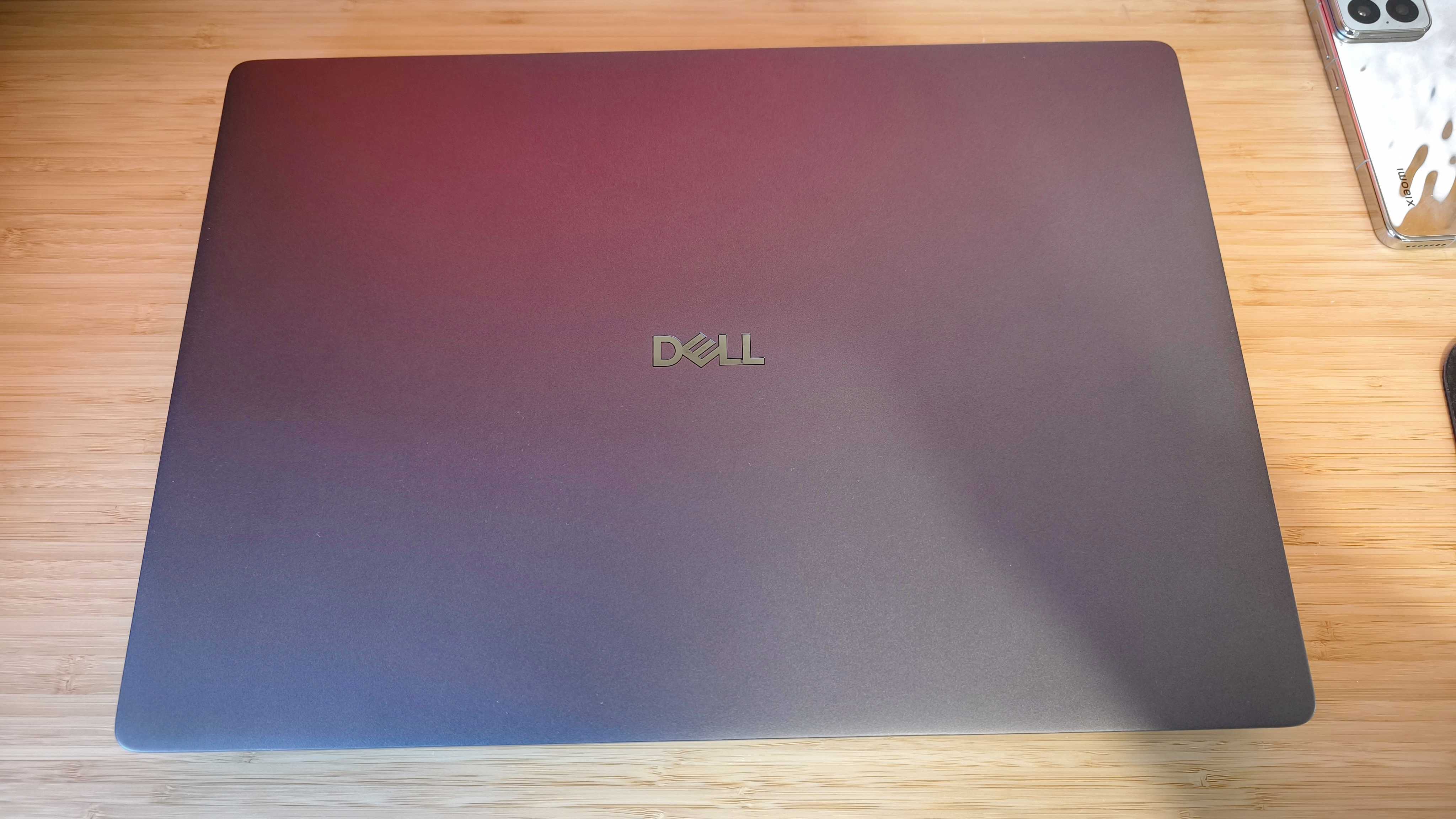 A Dell Pro Max 18 Plus laptop on a wooden desk