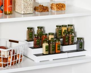 Spice rack shelf in cabinet