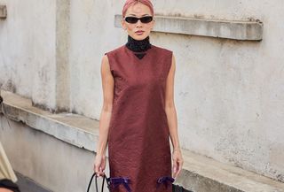 woman in burgundy dress