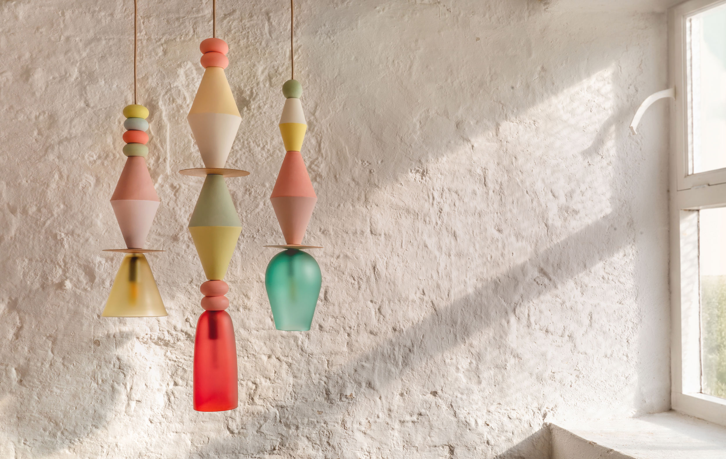 cluster of colourful pendant lamps