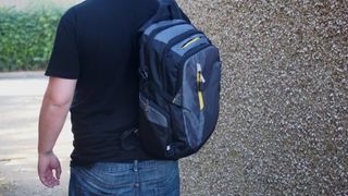 A laptop backpack being worn.
