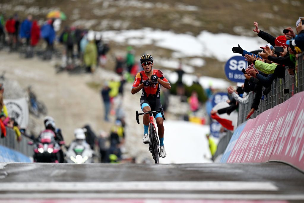 TRE CIME DI LAVAREDO ITALY MAY 26 Santiago Buitrago of Colombia and Team Bahrain Victorious celebrates at finish line as stage winner during the 106th Giro dItalia 2023 Stage 19 a 183km stage from Longarone to Tre Cime di Lavaredo 2307m UCIWT on May 26 2023 in Tre Cime di Lavaredo Italy Photo by Stuart FranklinGetty Images