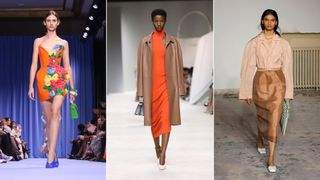Three models wearing orange outfits down the catwalk