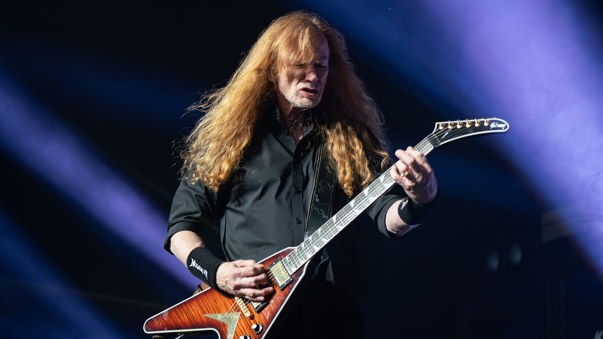 Dave Mustaine of Megadeth seen performing live on stage. Megadeth played London's O2 Arena as Special guests of the Band Disturbed on their 25th Anniversary tour Sick Things. Megadeth consists of Dave Mustaine (vocals, guitars), Teemu M&auml;ntysaari (guitars), James LoMenzo (bass), and Dirk Verbeuren (drums)