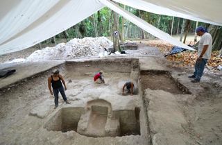 Archaeologists covered the site with a tent to protect it.