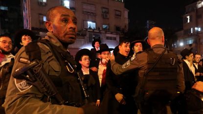 Israeli security forces keep the public away from a shooting in Bnei Brak, Tel Aviv 