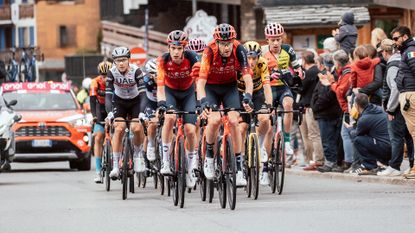 Team Ineos riders cycling in a group 