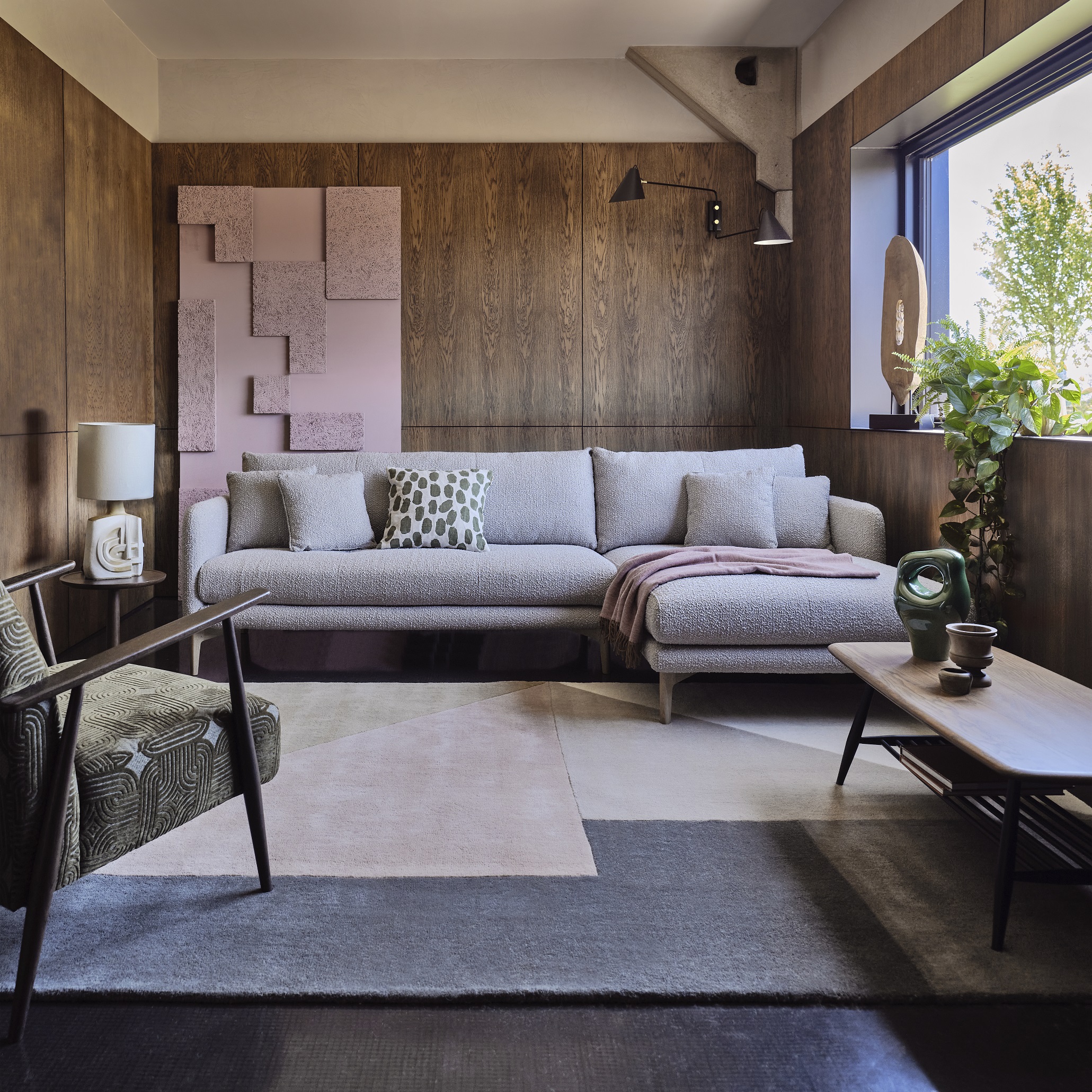 Living room with wood paneling.