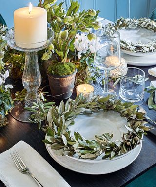 Thanksgiving wreath ideas with olive branch wreath on table setting with foliage centerpiece