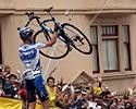 Mike Creed hoists his bike