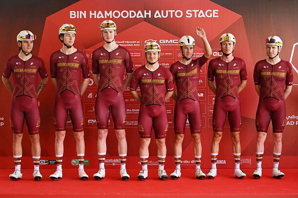 ABU DHABI, UNITED ARAB EMIRATES - FEBRUARY 16: A general view of Stefan de Bod of South Africa, Sean Christian of United States, Cole Kessler of United States, Byron Munton of South Africa, Ezra Caudell of United States, Riley Pickrell of Canada, Mark Stewart of Great Britain and Team Modern Adventure Pro Cycling prior to the 8th UAE Tour 2026, Stage 1 a 144km stage from Madinat Zayed Majlis to Liwa Palace on February 16, 2026 in Abu Dhabi, United Arab Emirates. (Photo by Tim de Waele/Getty Images)