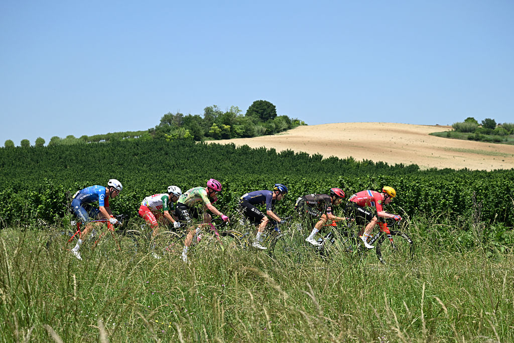 VERBANIA, ITALY - MAY 22: A general view of Johan Jacobs of Switzerland and Team Groupama - FDJ United, Diego Pablo Sevilla of Spain and Team Polti VisitMalta, Michael Valgren of Denmark and Team EF Education - EasyPost, Mark Donovan of Great Britain and Team Pinarello Q36.5 Pro Cycling, Larry Warbasse of United States and Team Tudor Pro Cycling and Andreas Leknessund of Norway and Team Uno-X Mobility compete in the breakaway during the 109th Giro d&amp;amp;apos;Italia 2026, Stage 13 a 189km stage from Alessandria to Verbania / #UCIWT / on May 22, 2026 in Verbania, Italy. (Photo by Dario Belingheri/Getty Images)