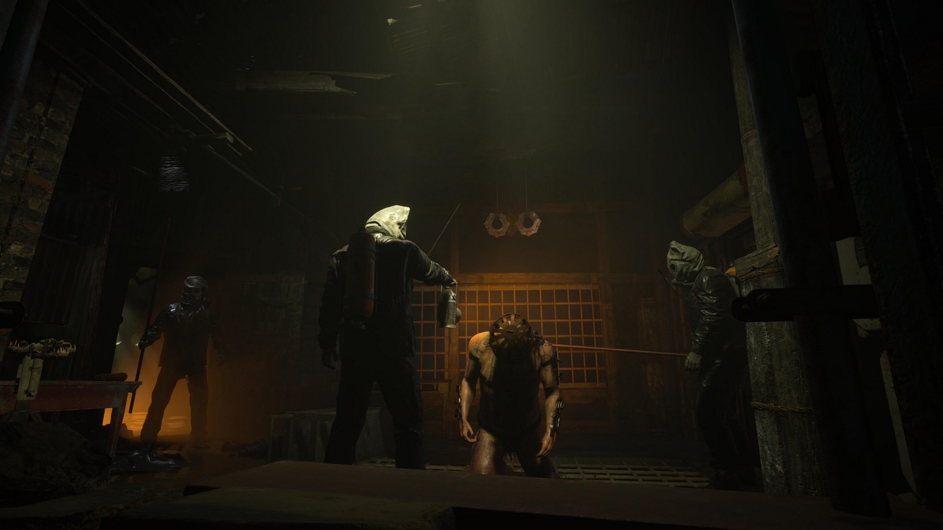 Gas mask men have a prisoner with a cage on their head in Sleep Awake